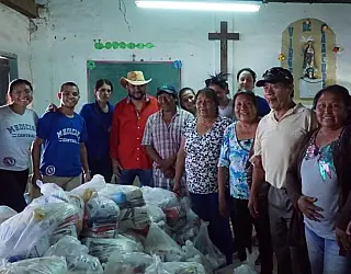 Comunidade recebe água, alimentos e calor humano após incêndios florestais